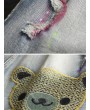 女士蓝色卡通熊破洞短牛仔裤