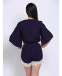 女士蓝色蕾丝连体裤 - 深V领、半袖